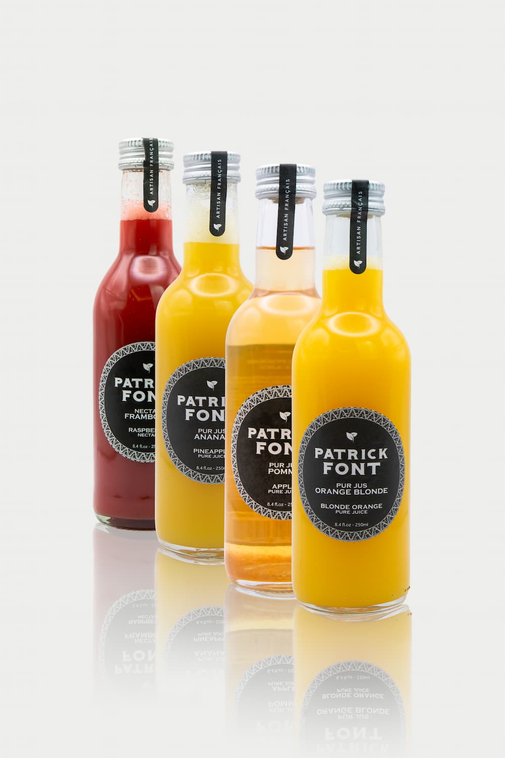 rinkinys_apelsinu_ananasu_obuoliu_avieciu Apelinsų, ananasų, aviečių ir mangų sulčių rinkinys